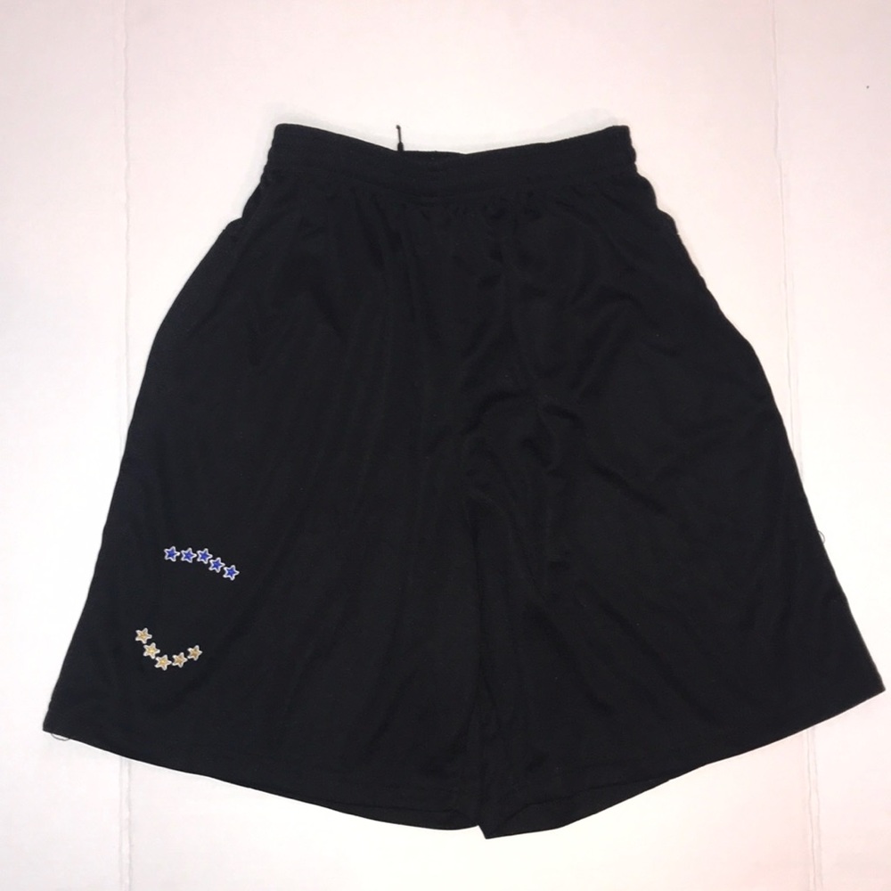 NWOT black youth active soccer shorts shorts with blue & yellow stars